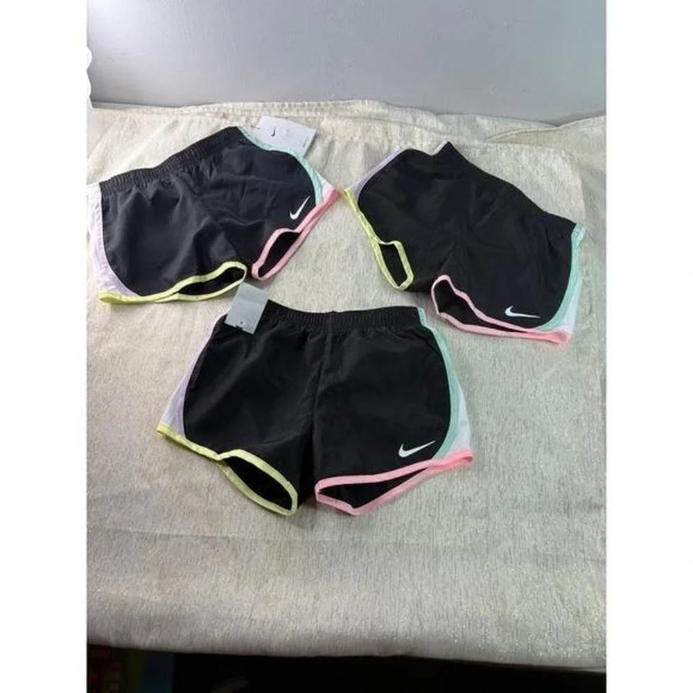 Three pairs of kids Nike dri fit short size 6
